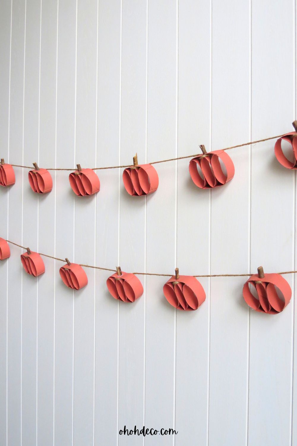 make pumpkin garland with toilet paper rolls