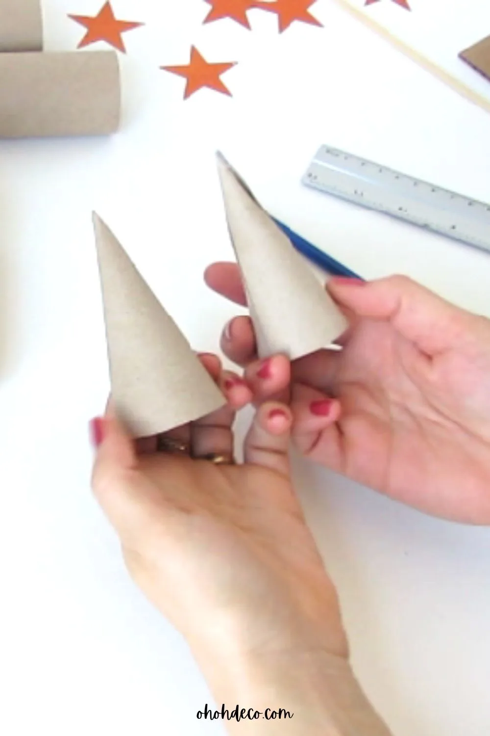 Make two cones using the paper roll